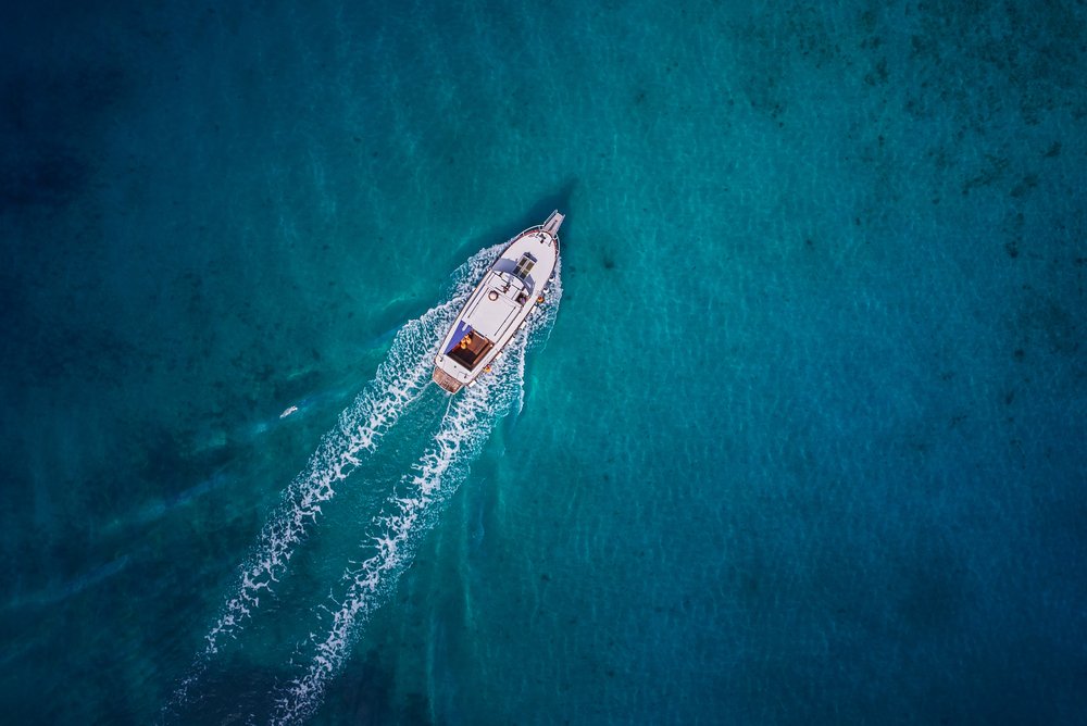 Vintage Wooden Boat In Coral Sea. Boat Drone Photo.