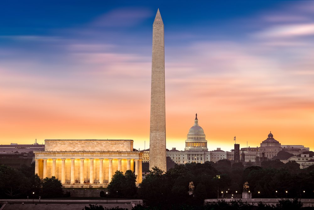 The tidal basin in Washington DC with the Washington Monument in the distance.