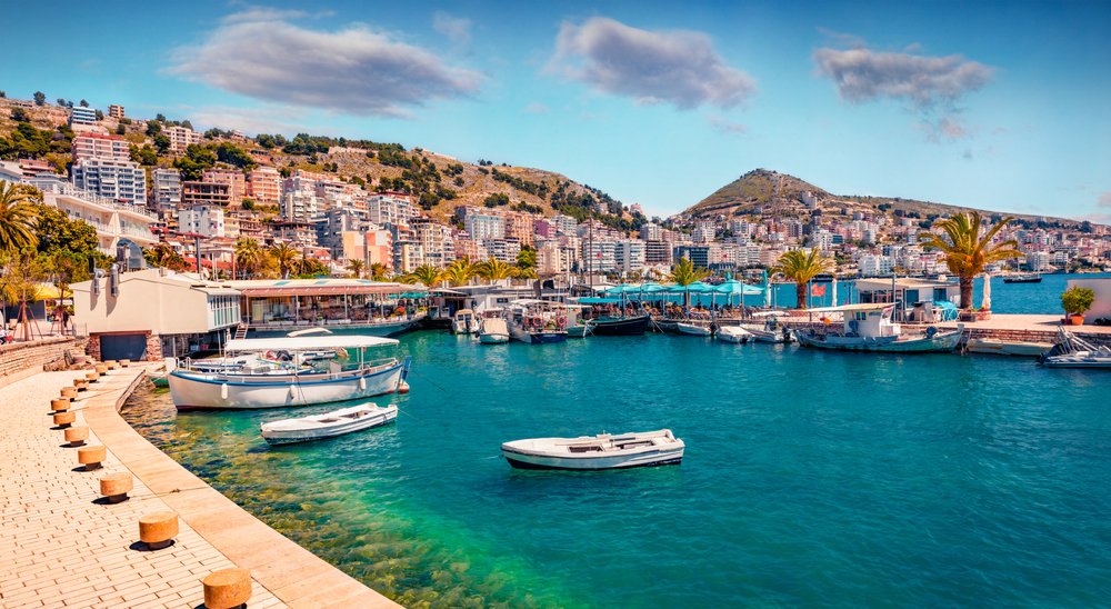 Perfect Spring Cityscape Of Saranda Port. Picturesque Ioninian Seascape. Bright