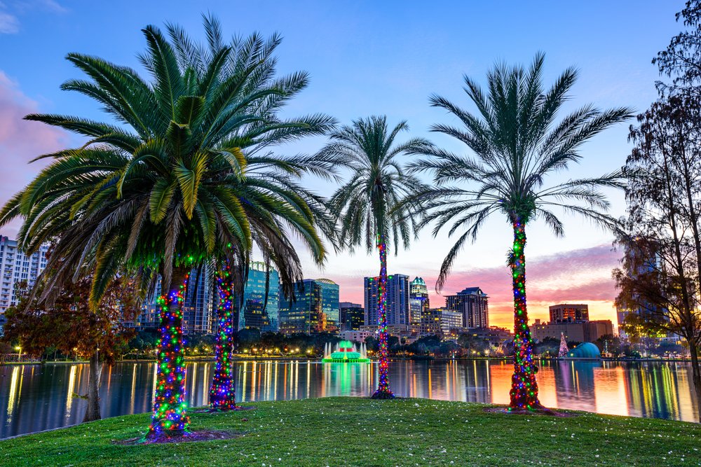 Orlando Florida USA Downtown Skyline At Eola Lake.