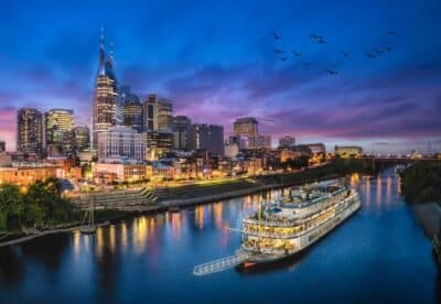 Nashville Skyline With River And Sunset