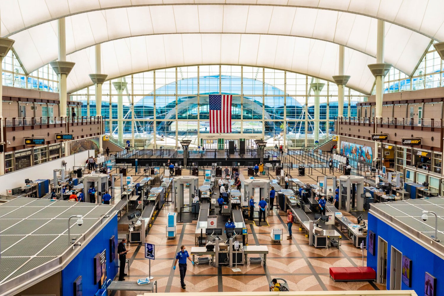 Denver, CO / USA: 5/8/2020 – Denver International Airport security gates at summer