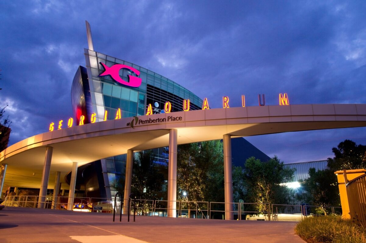 The Georgia Aquarium facade at night in Atlanta, Georgia. The boat shaped landmark is the world’s largest aquarium with more than 8 million gallons of water.