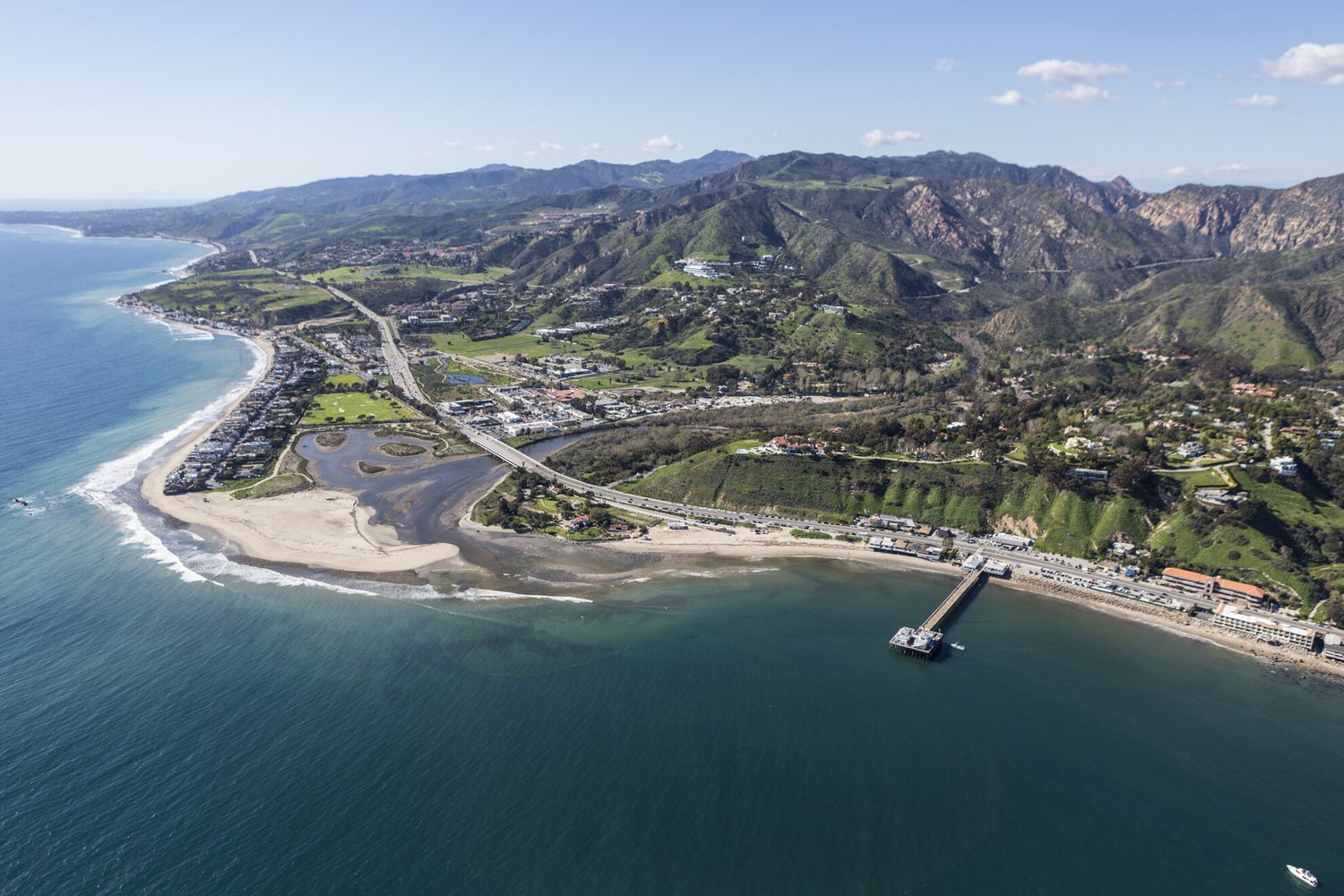 Aerial view of Malibu Pier and Surfrider Beach near Los Angeles, California.