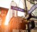 Street sign of Fifth Ave and West 33rd St at sunset in New York City