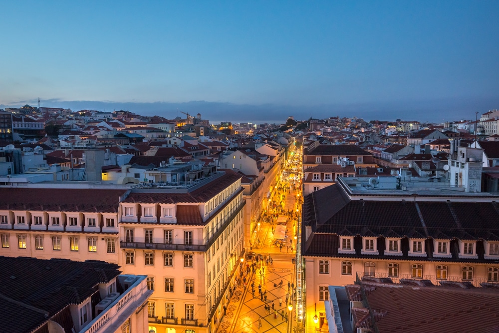 Aerial view of pedestrian street with perspective. Street Rua da Prata at night in Lisbon one of the main streets of Baixa Pombalina