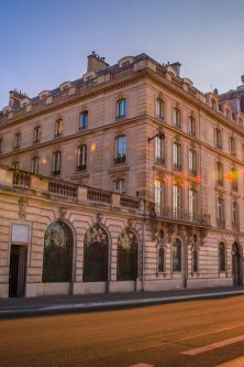 Sunset view of Orsay Museum on left bank of Seine, Paris, France.